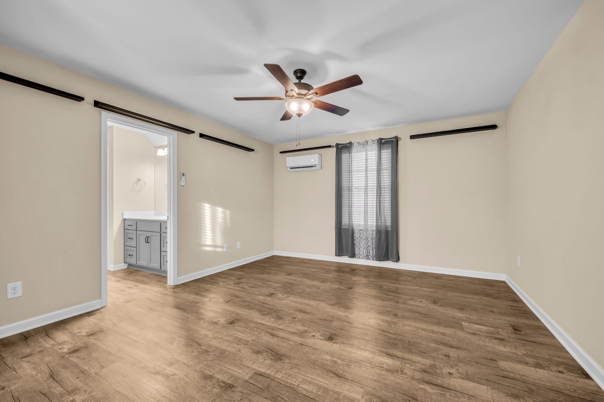 116 Eno Road Dickson, TN 37055 - Photo 17 of 28 a view of an empty room with a ceiling fan