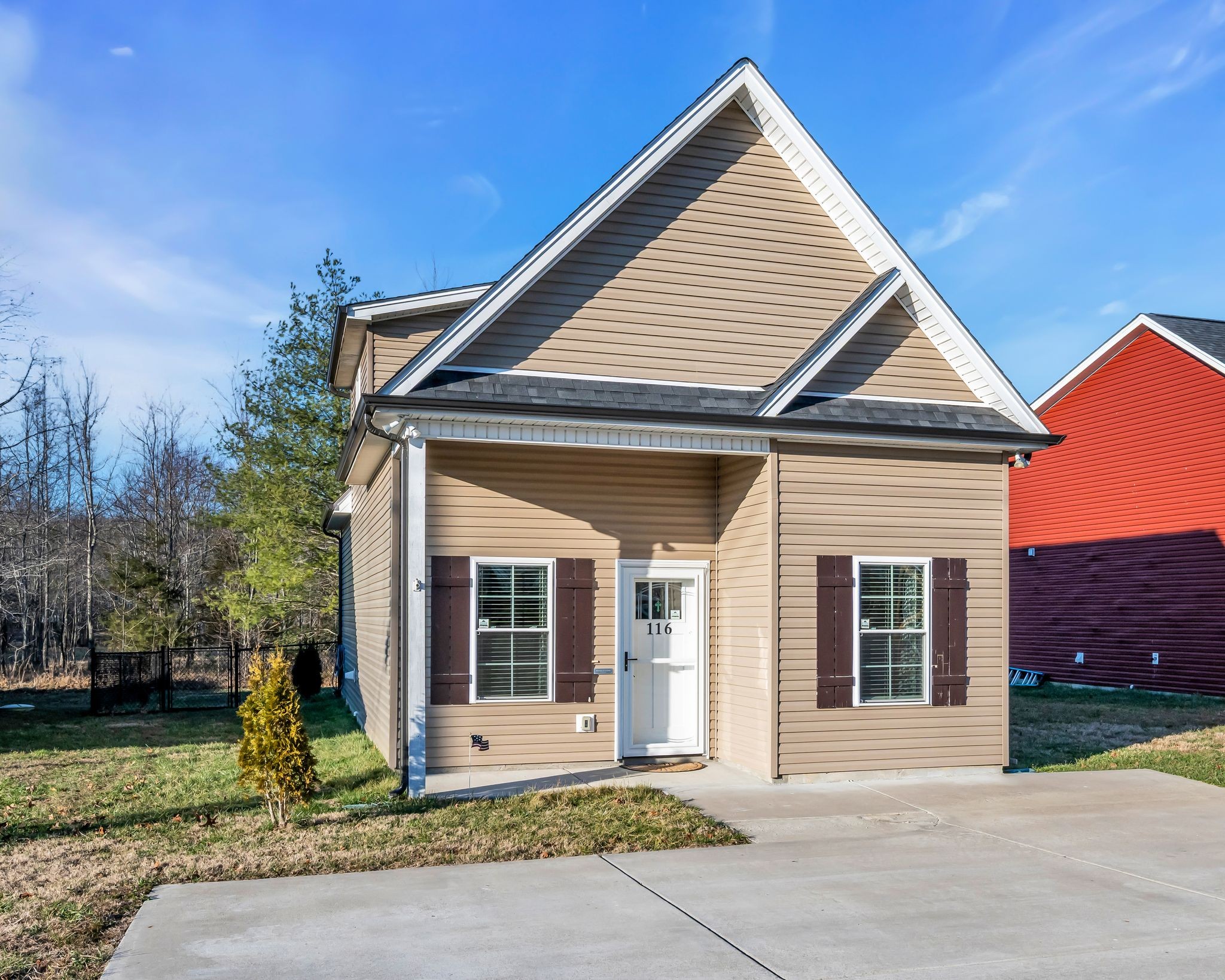 116 Eno Road Dickson, TN 37055 - Photo 2 of 28 a front view of a house with garden