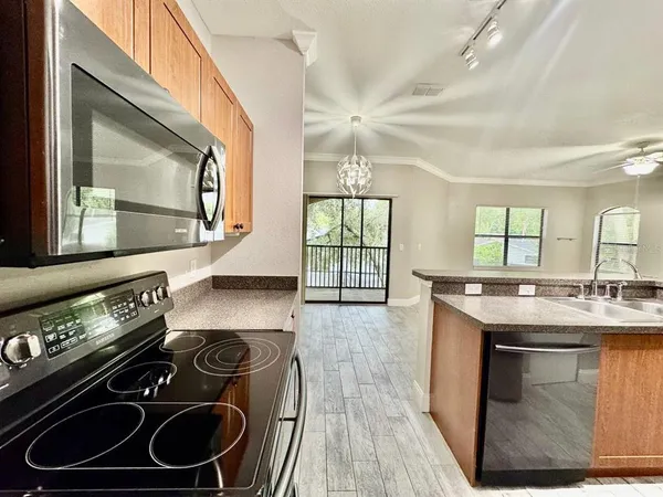 a kitchen with a stove and a sink