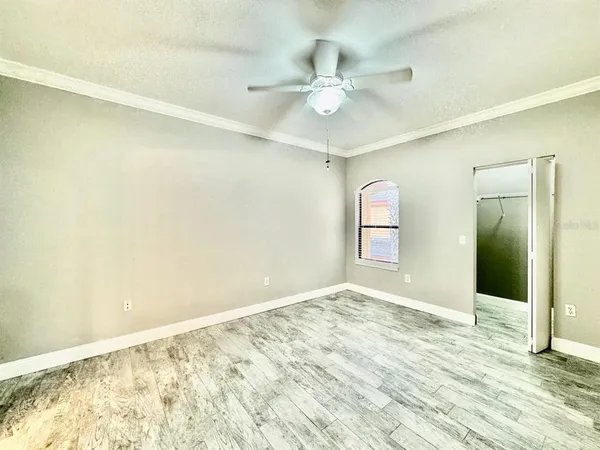 a view of an empty room and window