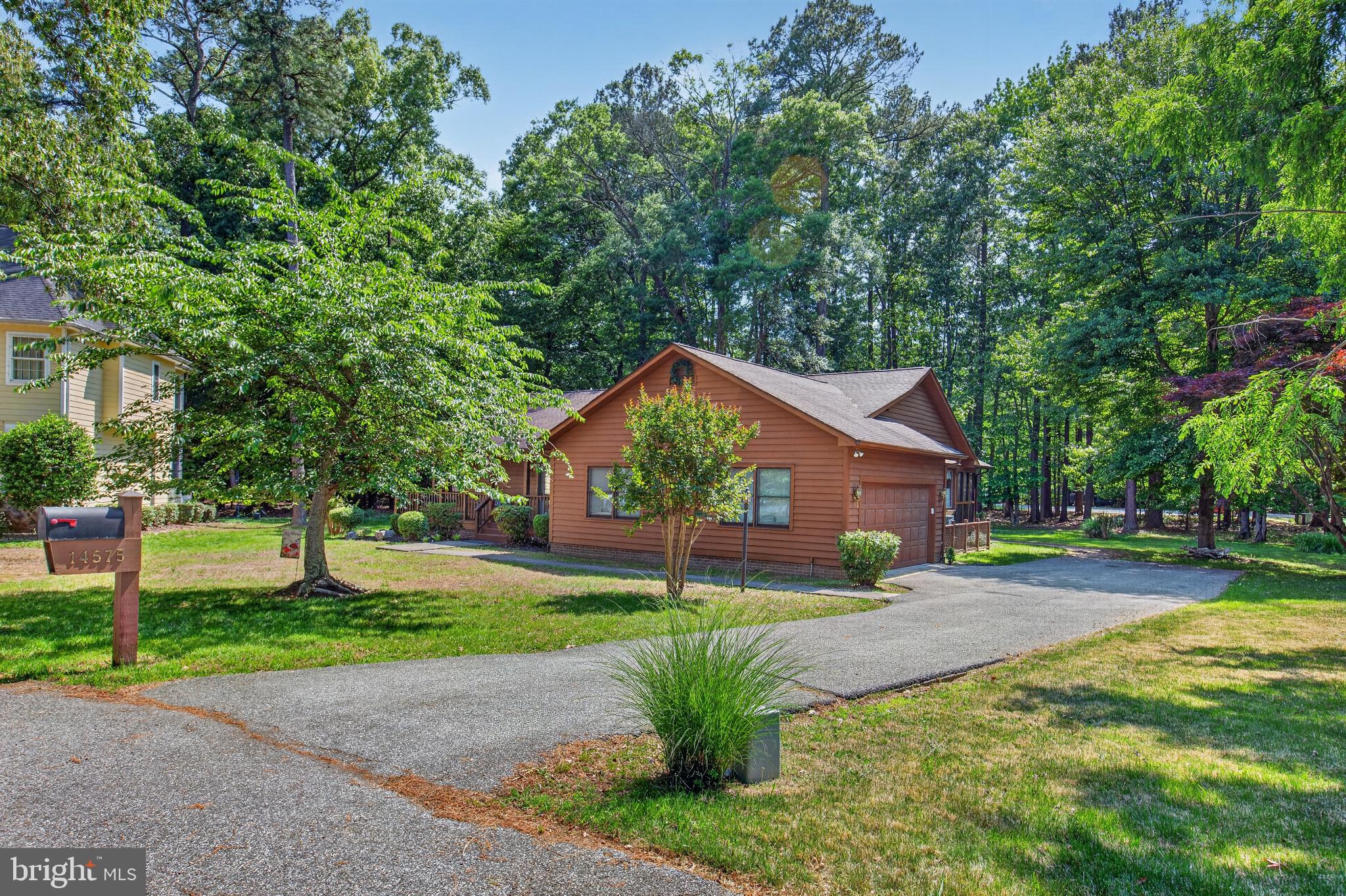 14575 Honeysuckle Way Issue, MD 20645 - Photo 20 of 49 a house view with a garden space