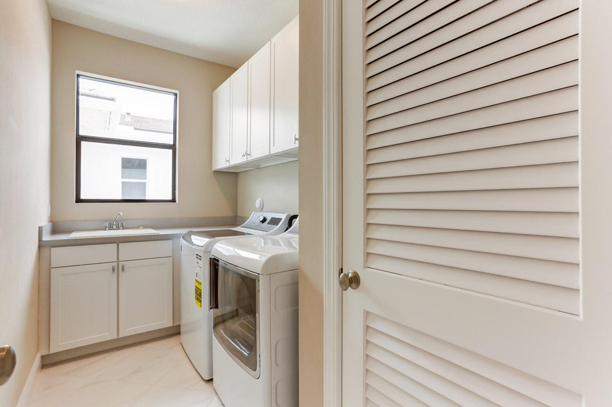 5013 Grandiflora Road Palm Beach Gardens, FL 33418 - Photo 19 of 30 Lot 15 5013 Grandiflora Upstairs Laundry