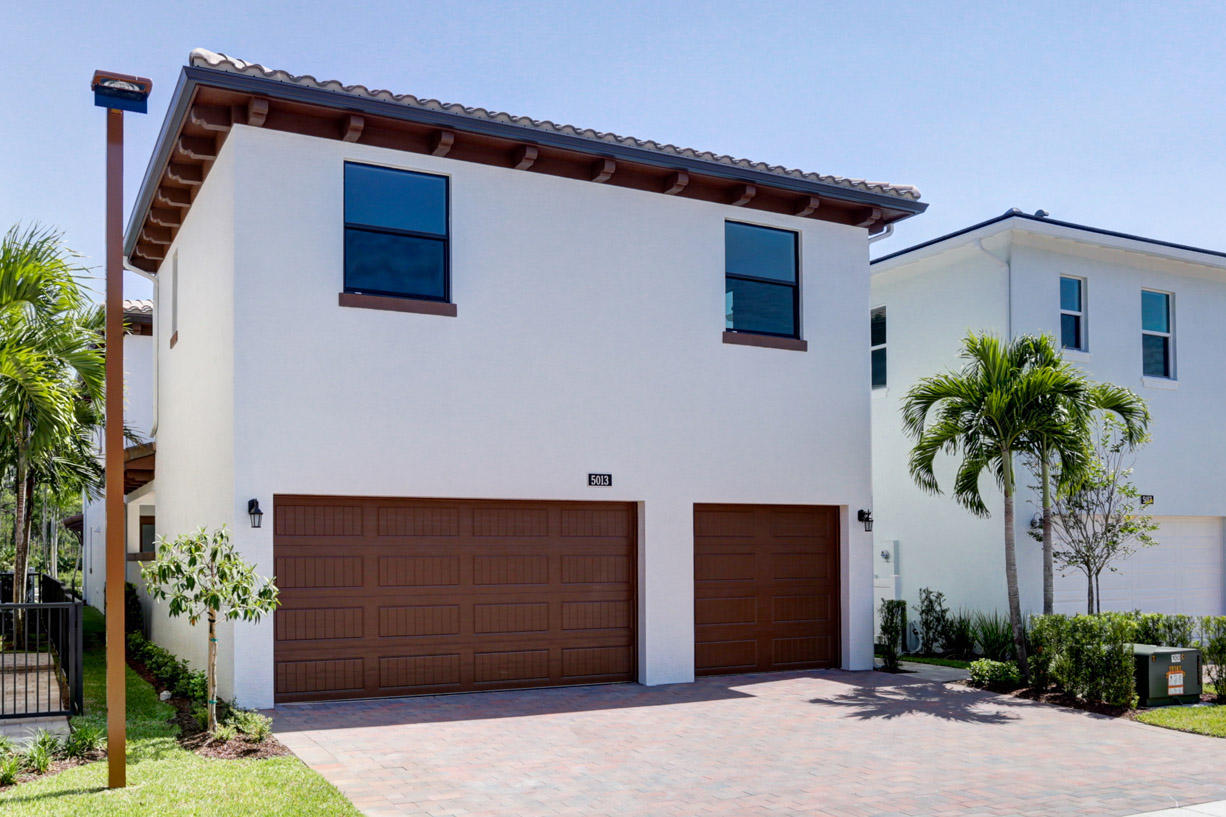 5013 Grandiflora Road Palm Beach Gardens, FL 33418 - Photo 26 of 30 Lot 15 5013 Grandiflora Garage entry