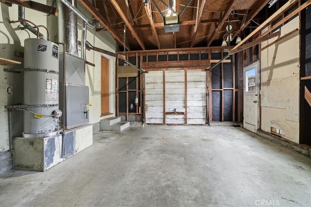 a view of an empty room with stairs
