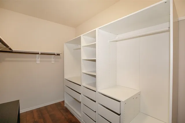a view of an empty walk in closet