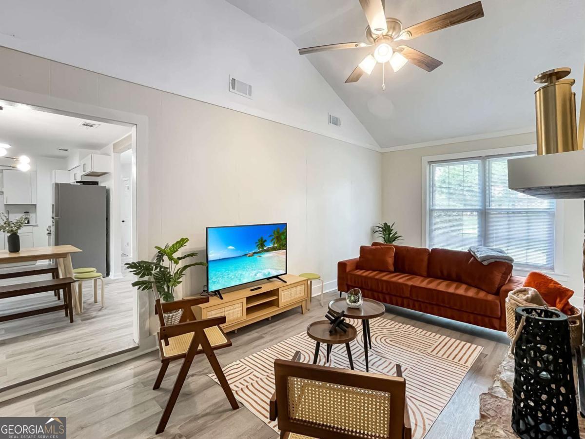1224 Crawford Way Pooler, GA 31322 - Photo 3 of 12 a living room with furniture and a flat screen tv