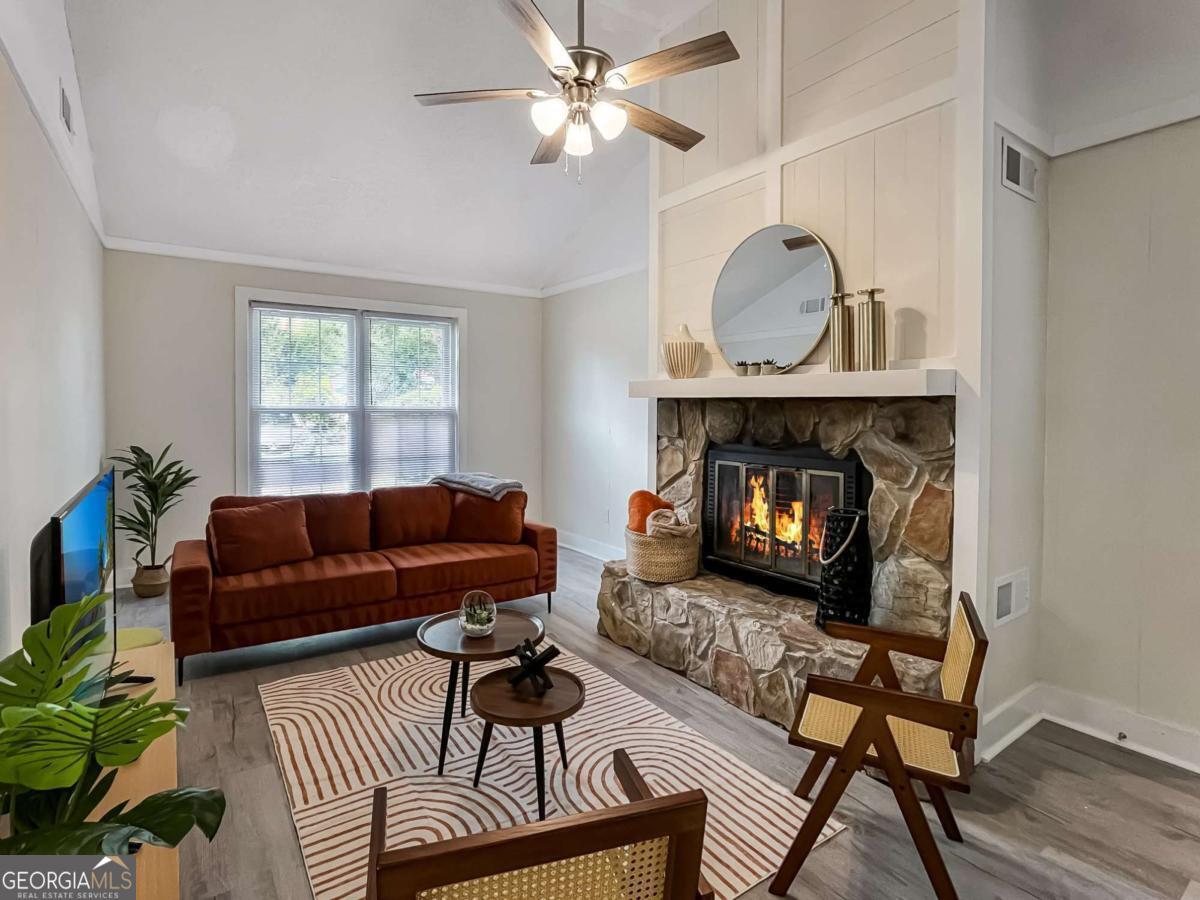 1224 Crawford Way Pooler, GA 31322 - Photo 4 of 12 a living room with furniture and a fireplace