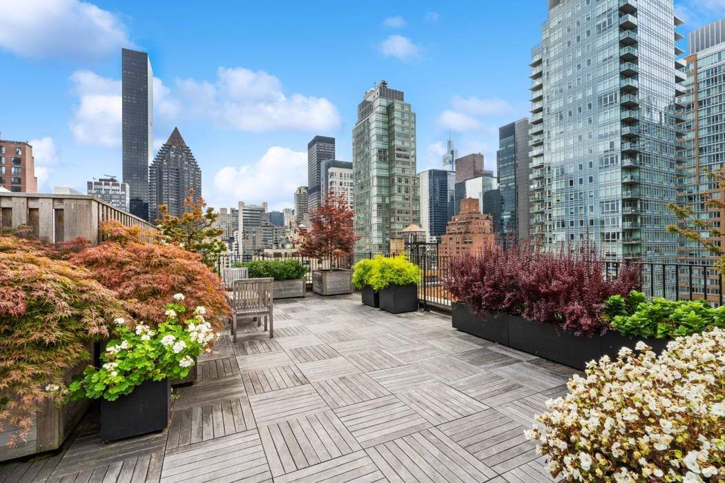 333 East 53rd Street, Unit 5B Manhattan, NY 10022 - Photo 10 of 12 a view of a city with tall buildings