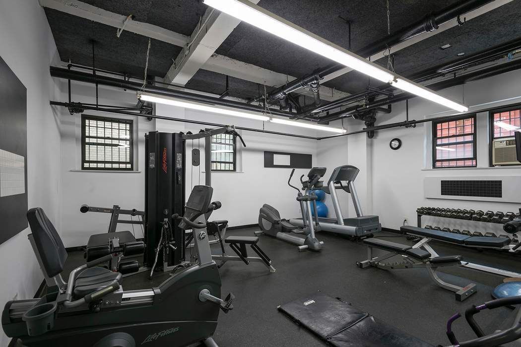 333 East 53rd Street, Unit 5B Manhattan, NY 10022 - Photo 11 of 12 a view of a room with gym equipment