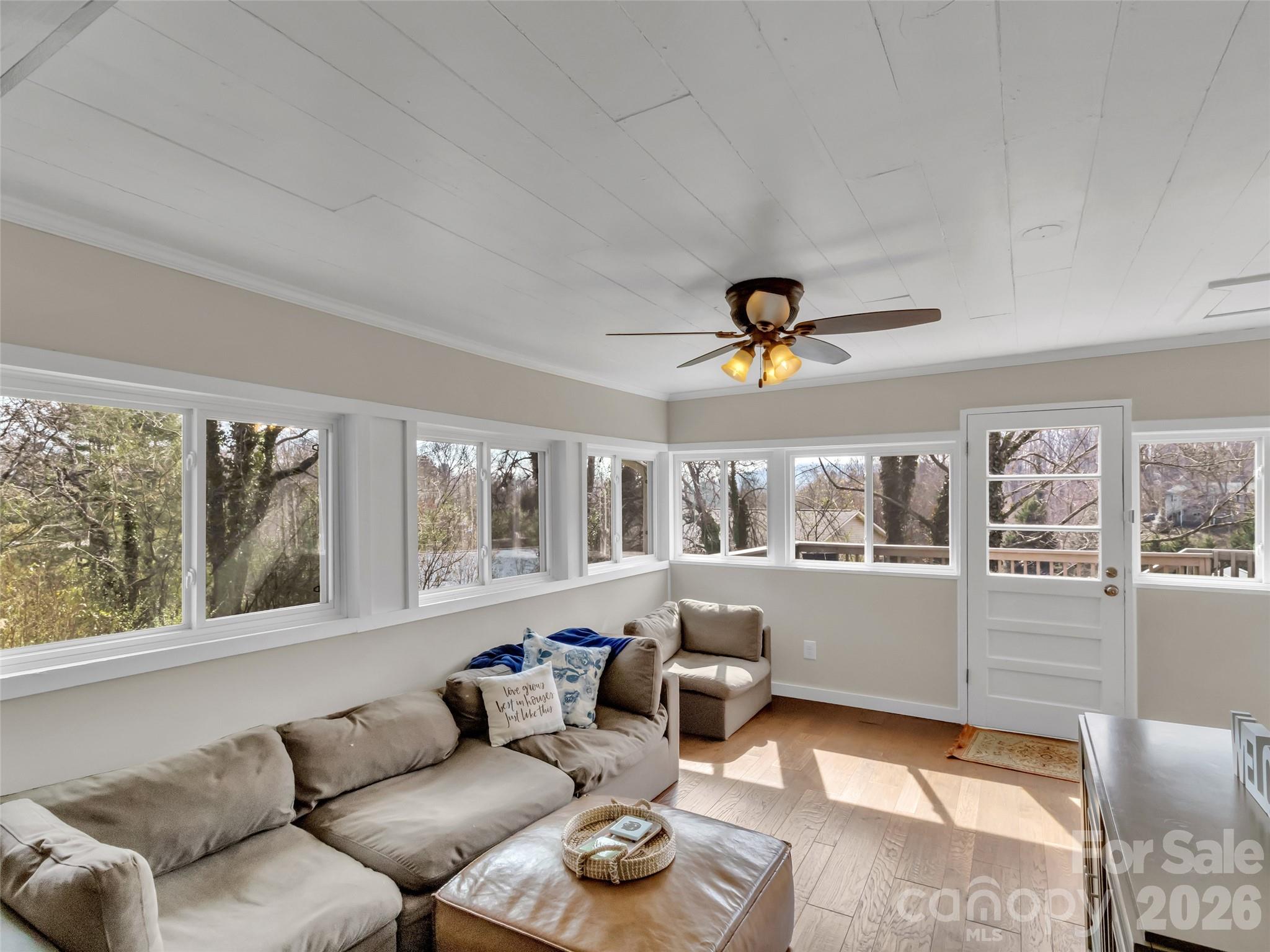 43 Melton Road Candler, NC 28715 - Photo 13 of 44 a living room with furniture and a large window