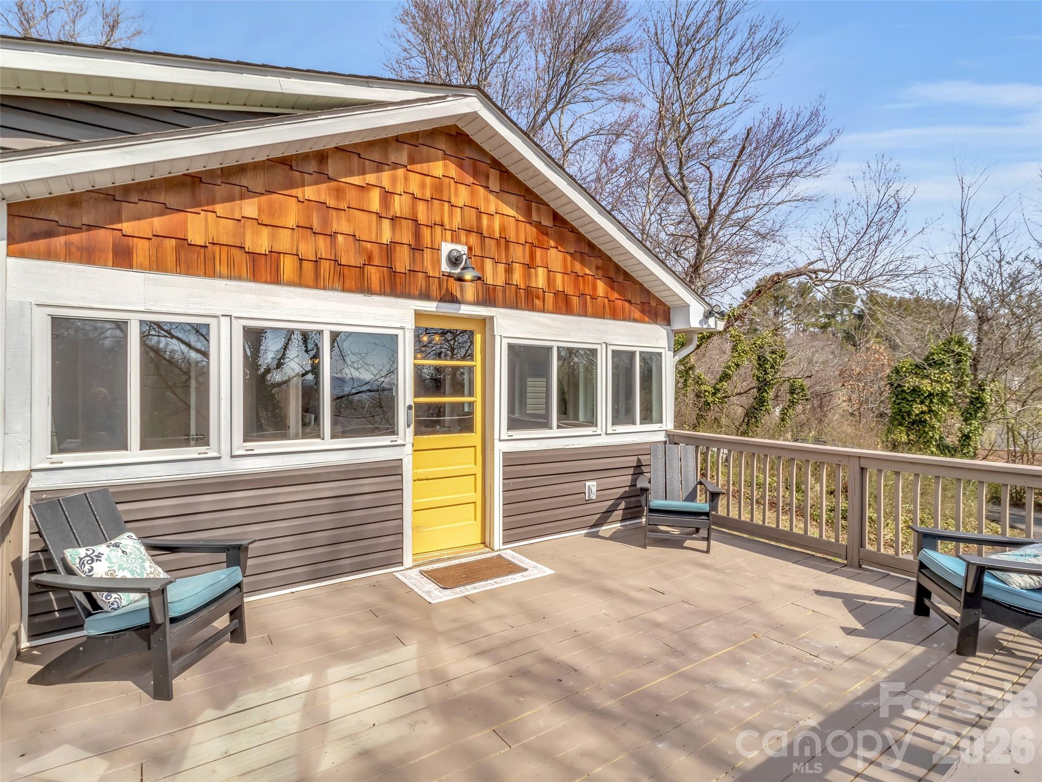 43 Melton Road Candler, NC 28715 - Photo 23 of 44 a view of a building with a backyard