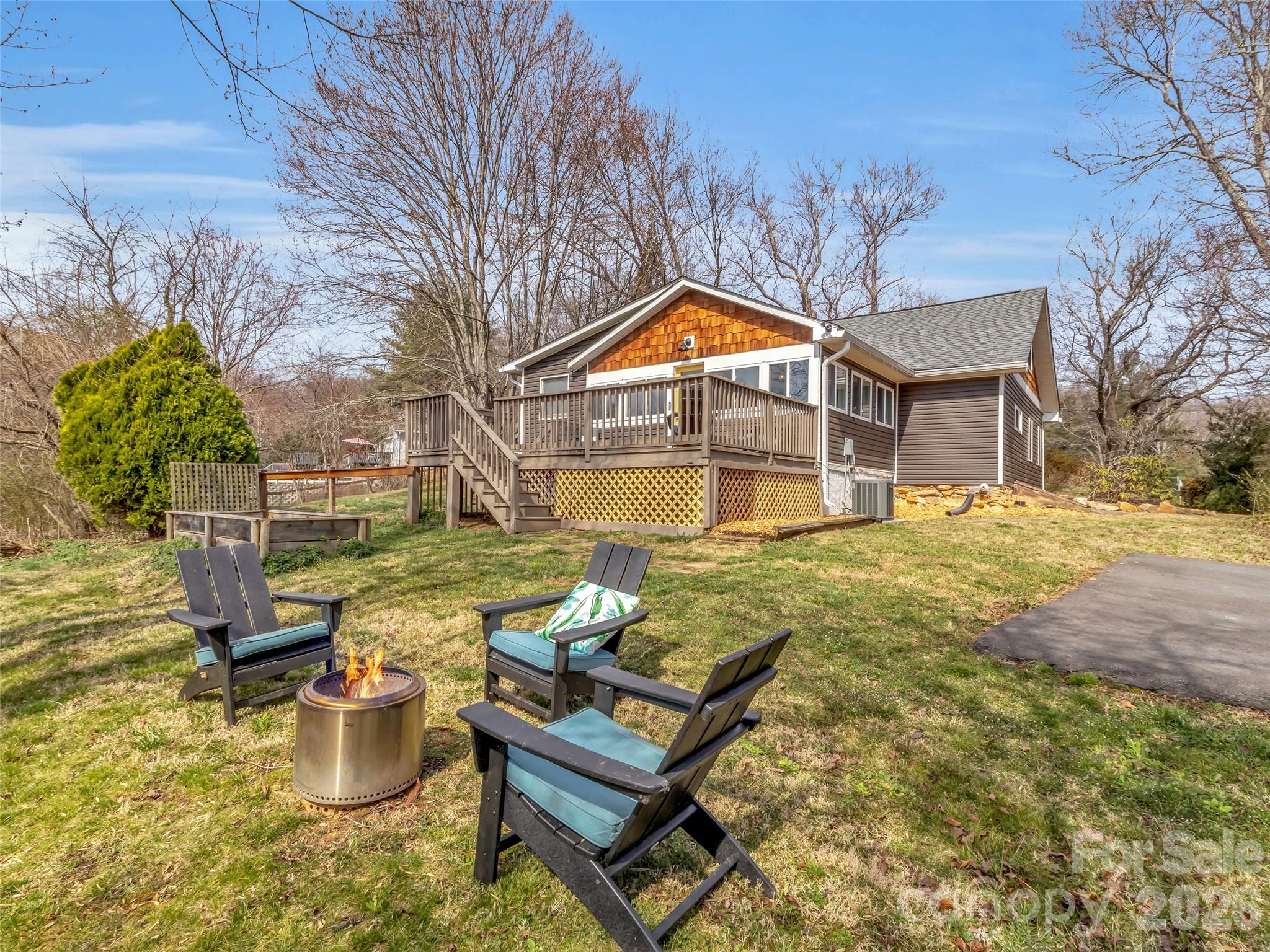 43 Melton Road Candler, NC 28715 - Photo 27 of 44 a front view of a house with swimming pool