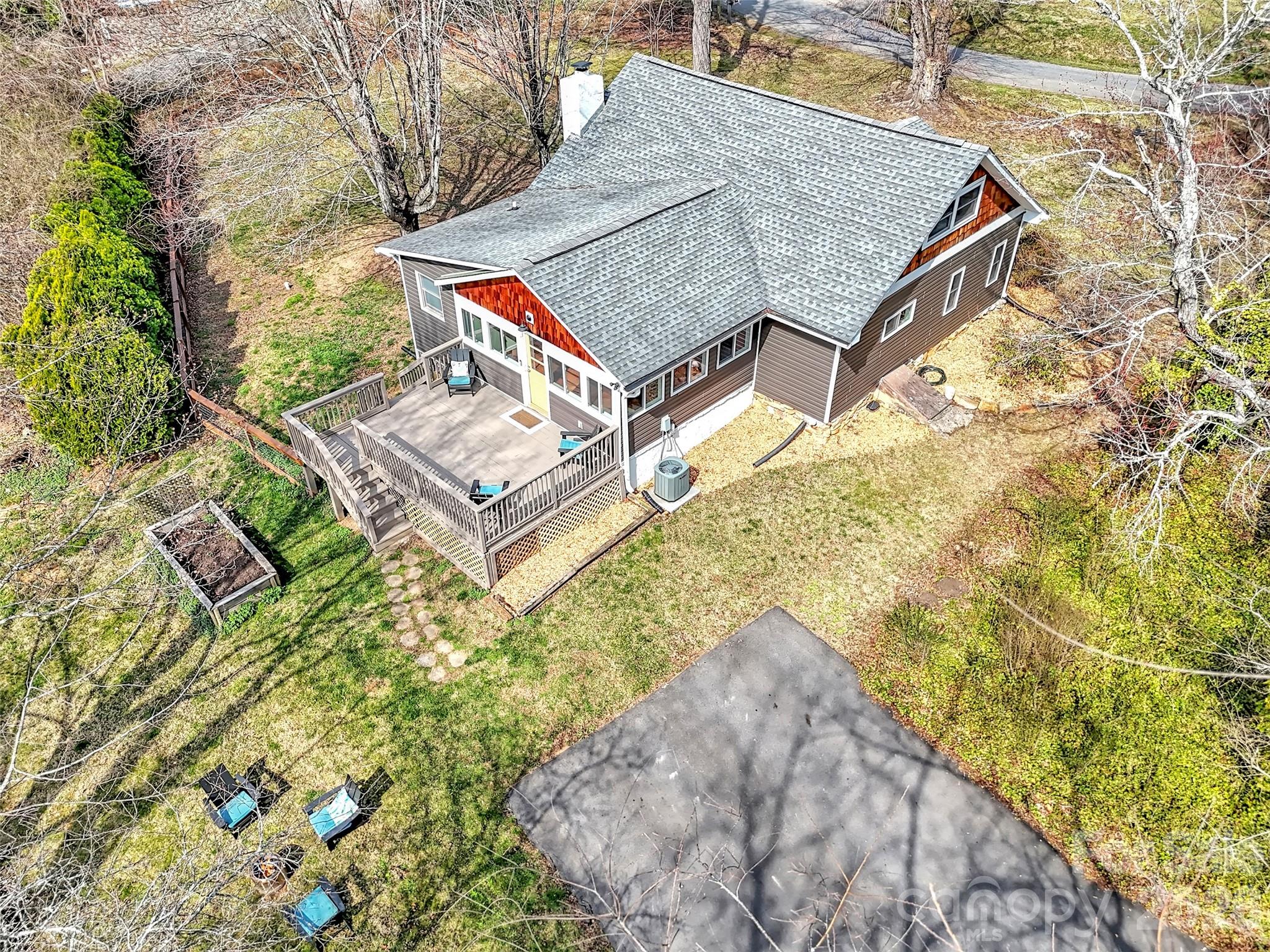43 Melton Road Candler, NC 28715 - Photo 28 of 44 view of a house with a yard