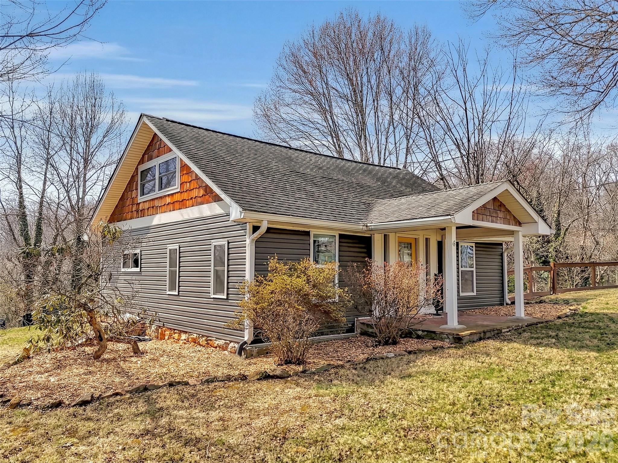 43 Melton Road Candler, NC 28715 - Photo 3 of 44 a view of house with yard