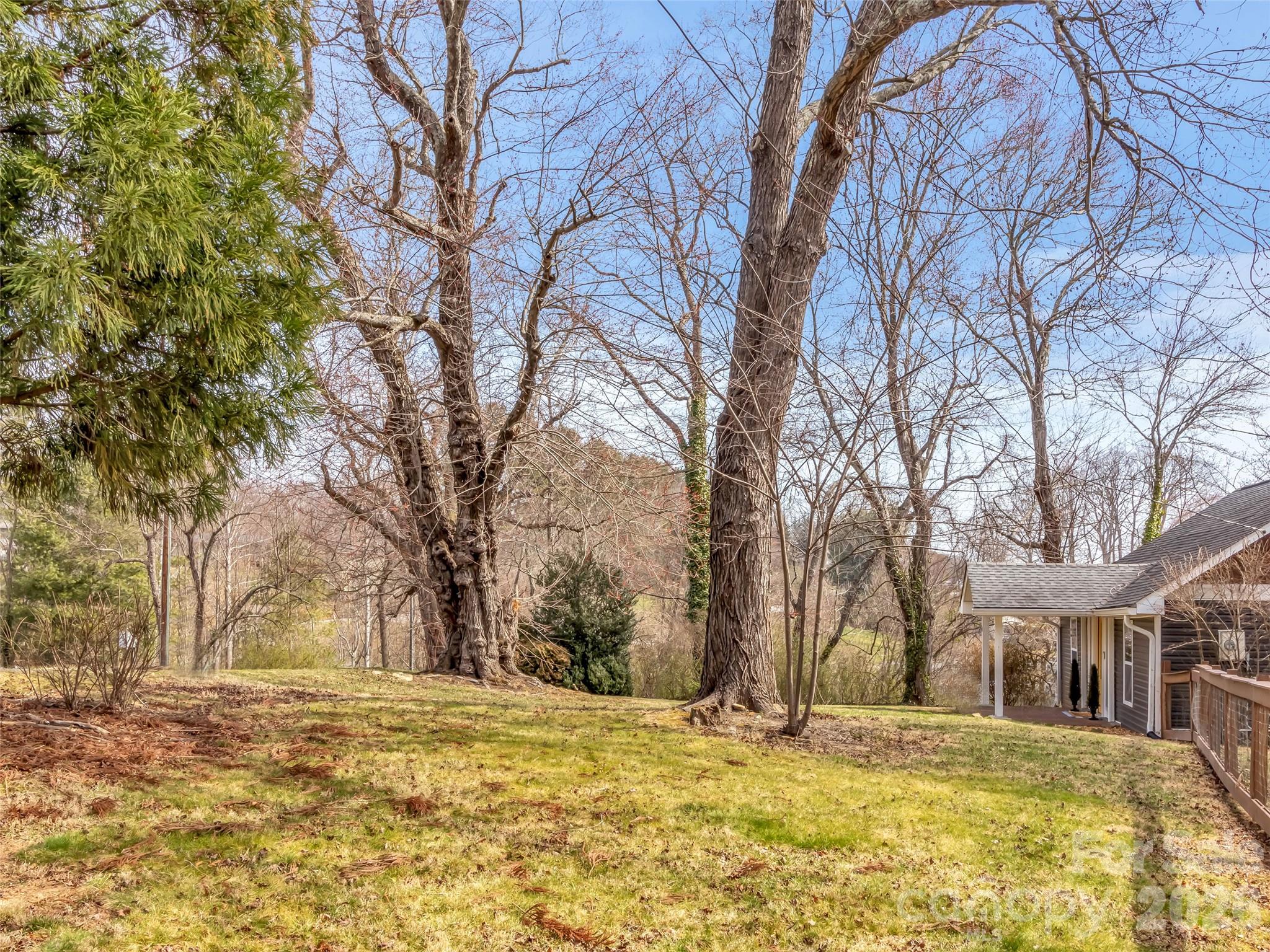 43 Melton Road Candler, NC 28715 - Photo 35 of 44 a view of a yard with a house