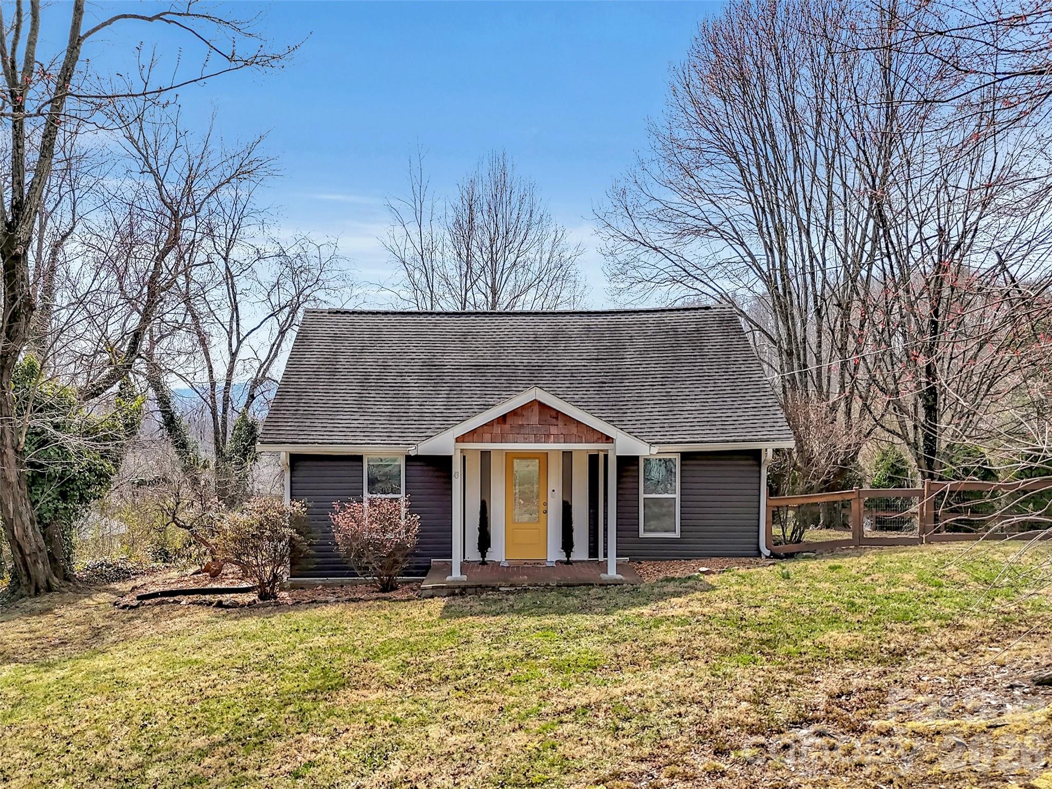 43 Melton Road Candler, NC 28715 - Photo 37 of 44 a front view of a house with a yard
