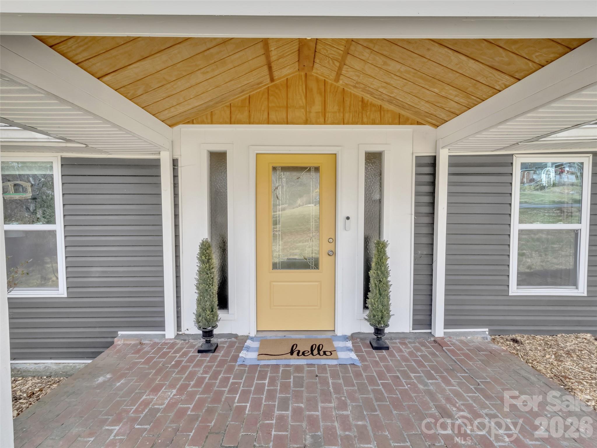 43 Melton Road Candler, NC 28715 - Photo 4 of 44 a view of a house with a door