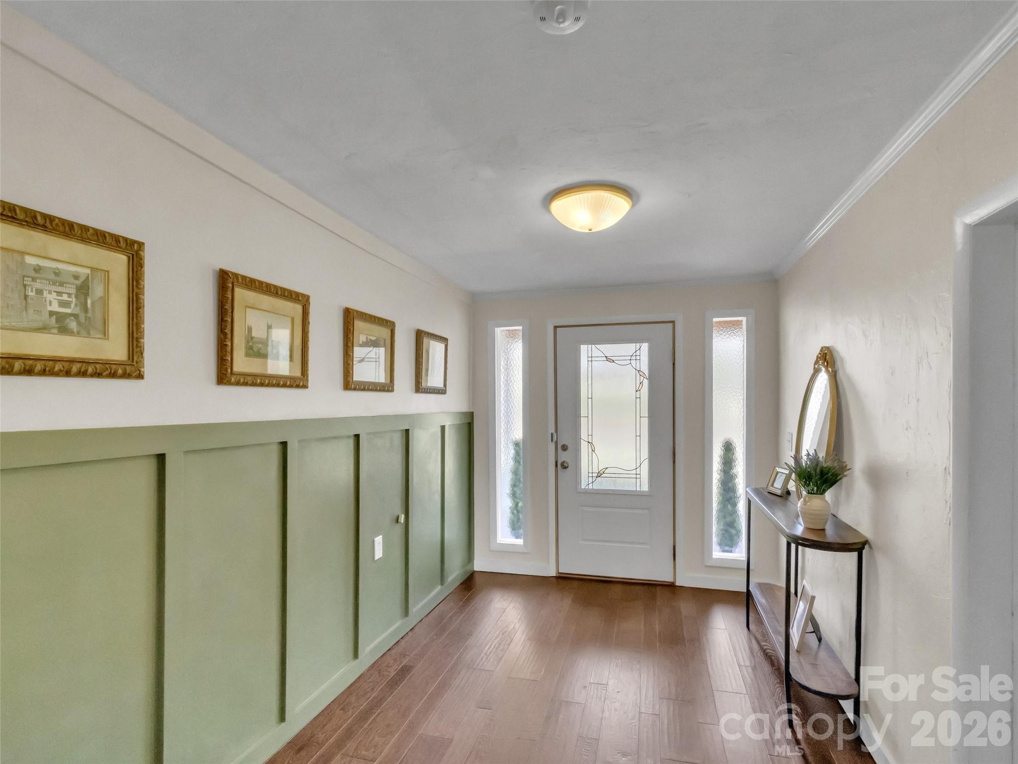 43 Melton Road Candler, NC 28715 - Photo 5 of 44 a view of livingroom with furniture and wooden floor