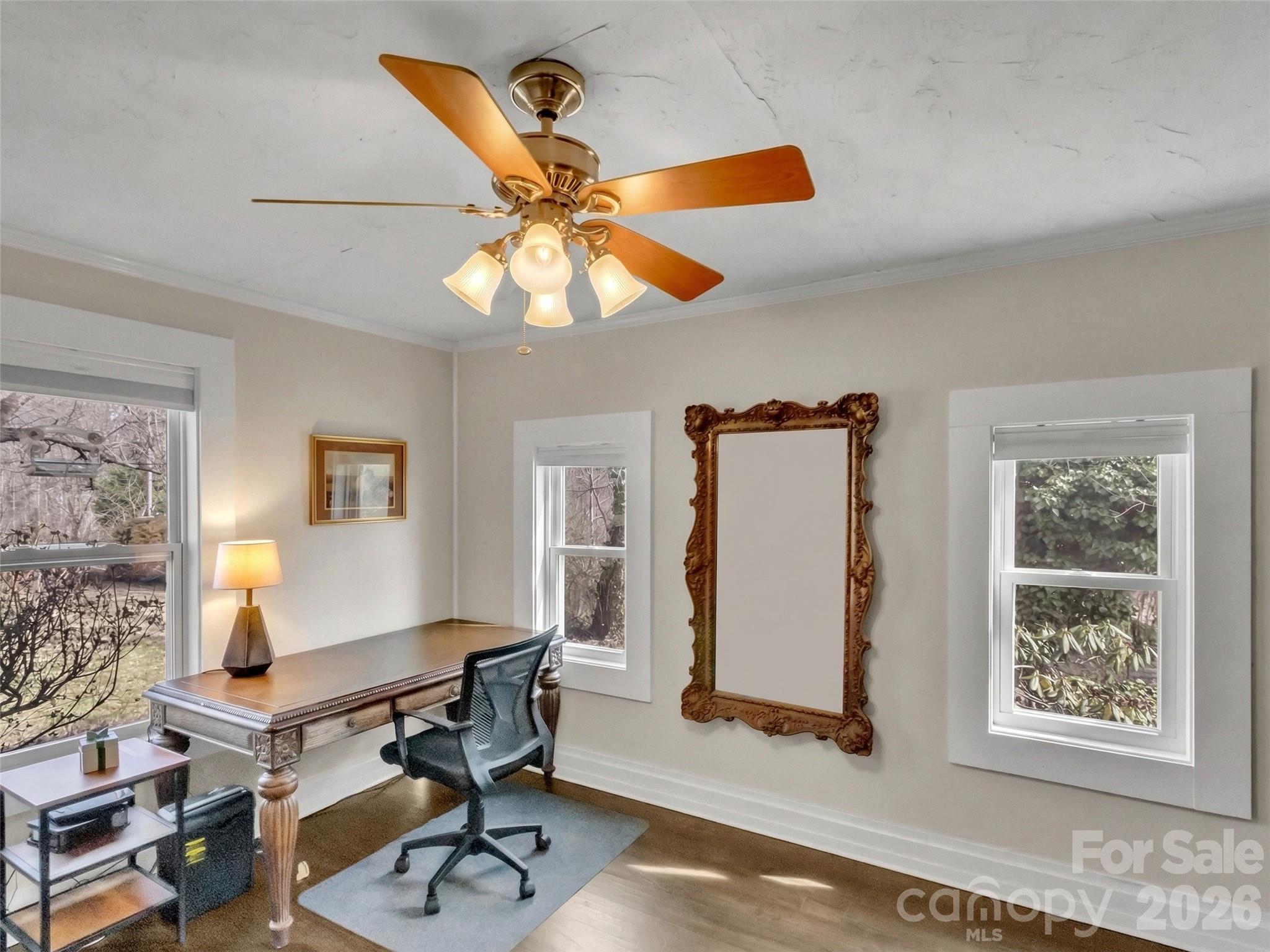 43 Melton Road Candler, NC 28715 - Photo 9 of 44 a view of a workspace with furniture and a window
