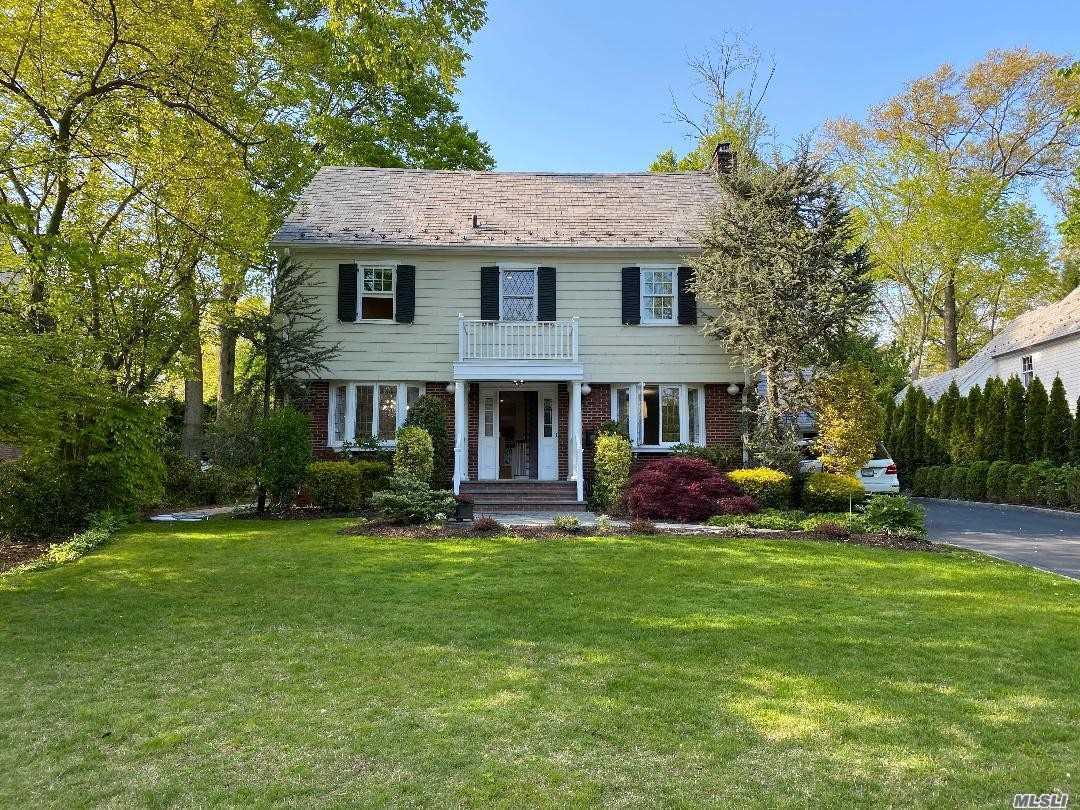 337 Ryder Road Manhasset, NY 11030 - Photo 1 of 1 a view of a house with a yard and sitting area