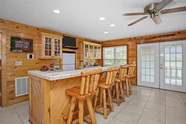a very nice looking kitchen with a large window