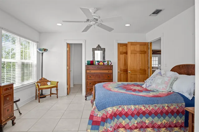 a bedroom with a bed and furniture