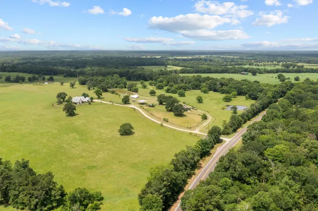 a view of a swimming pool with an ocean view