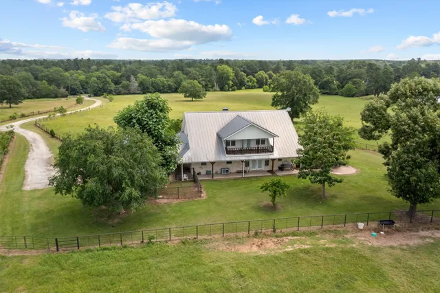 a view of a lake with a yard