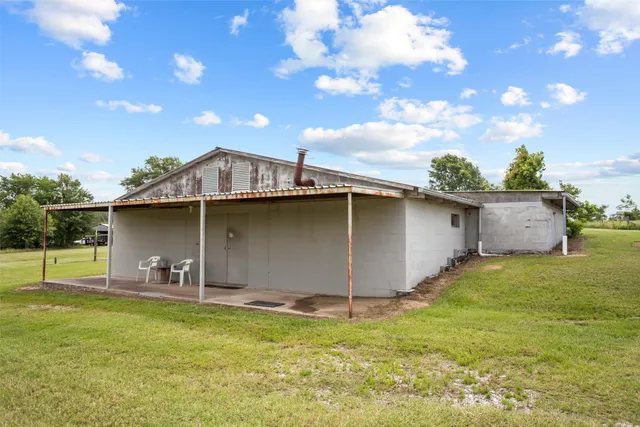 a backyard of a house with lots of green space