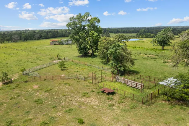 a view of a lake with a yard