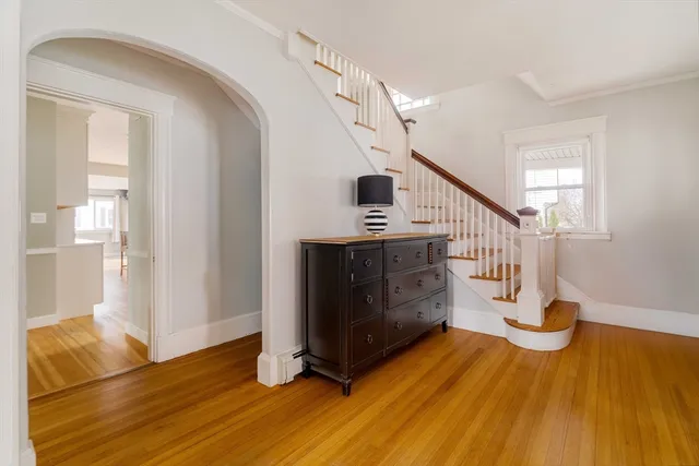 a view of entryway with wooden floor