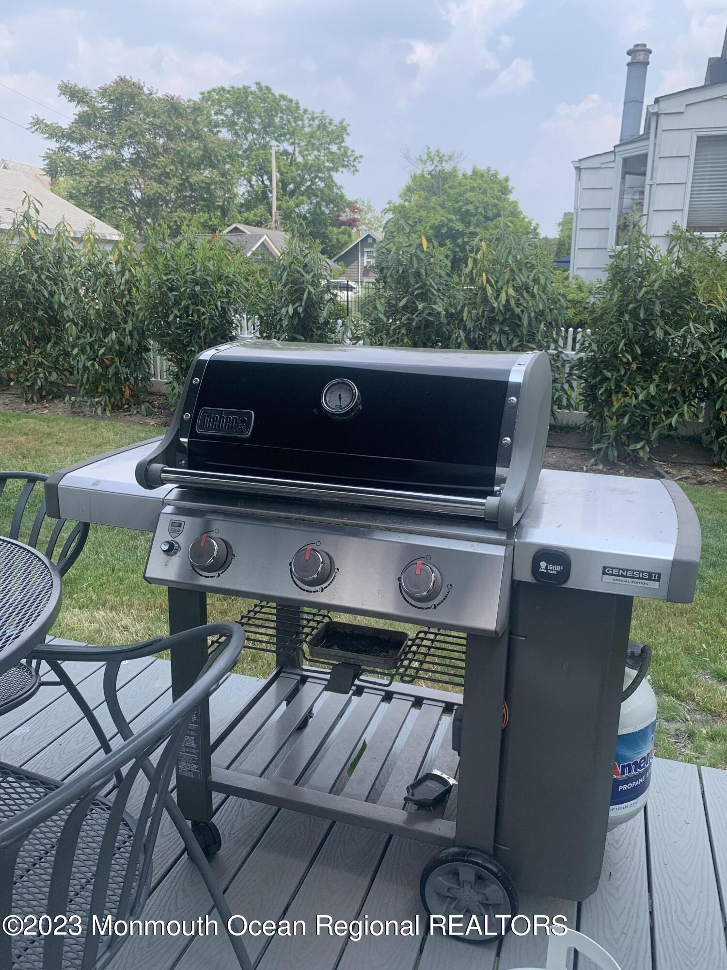 312 Salem Avenue Spring Lake, NJ 07762 - Photo 15 of 18 an outdoor sitting area with furniture and a fireplace
