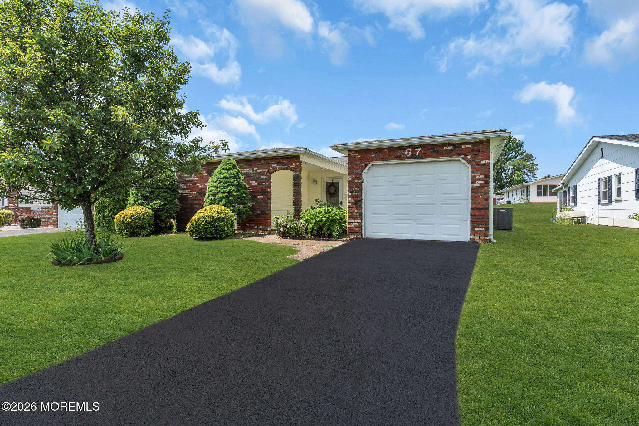 67 Blake Circle Brick, NJ 08724 - Photo 4 of 34 a front view of house with yard and green space