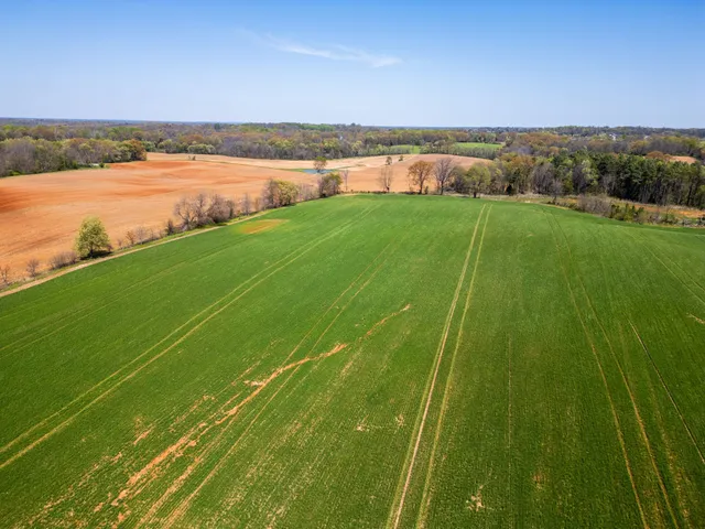 a view of a lake with a big yard