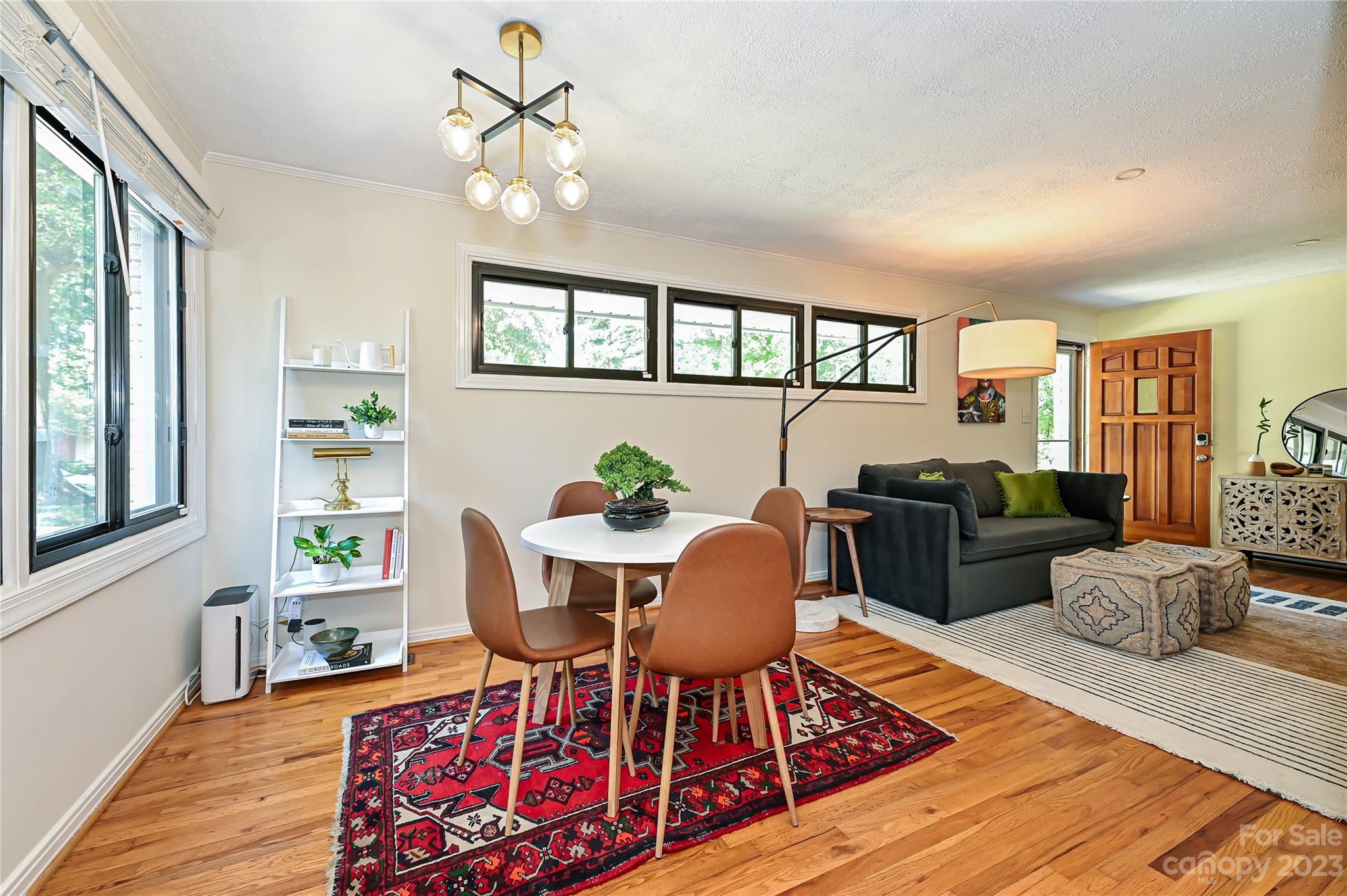 4609 Murrayhill Road Charlotte, NC 28209 - Photo 14 of 38 a living room with furniture fireplace and wooden floor