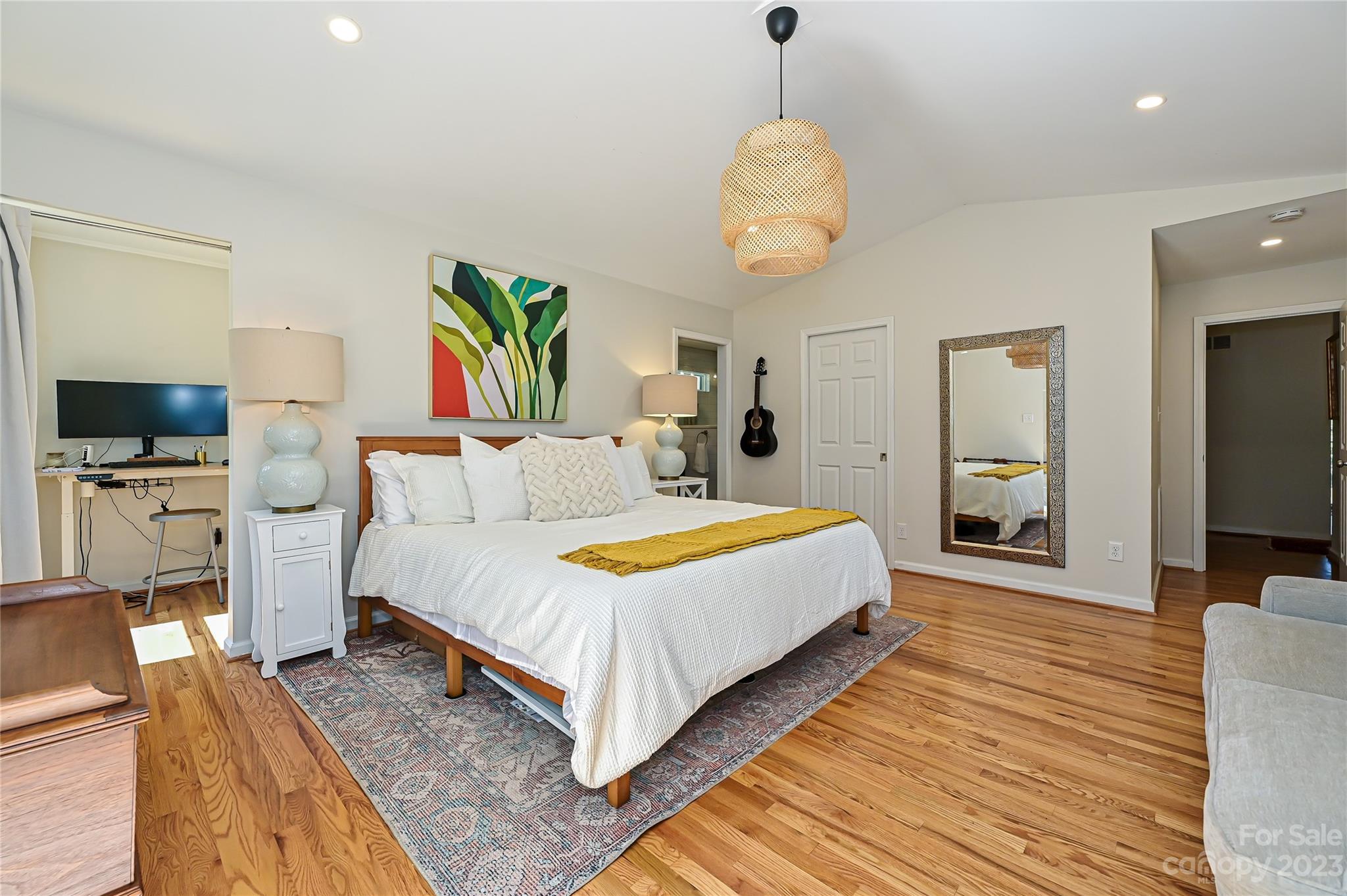 4609 Murrayhill Road Charlotte, NC 28209 - Photo 19 of 38 a spacious bedroom with a bed and a flat screen tv