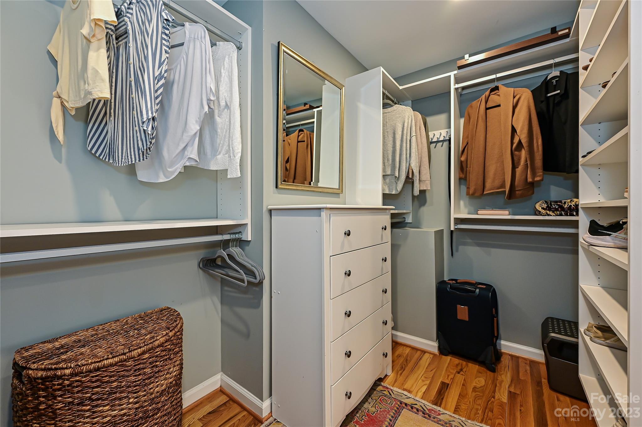 4609 Murrayhill Road Charlotte, NC 28209 - Photo 25 of 38 a view of walk in closet with clothes and shoes