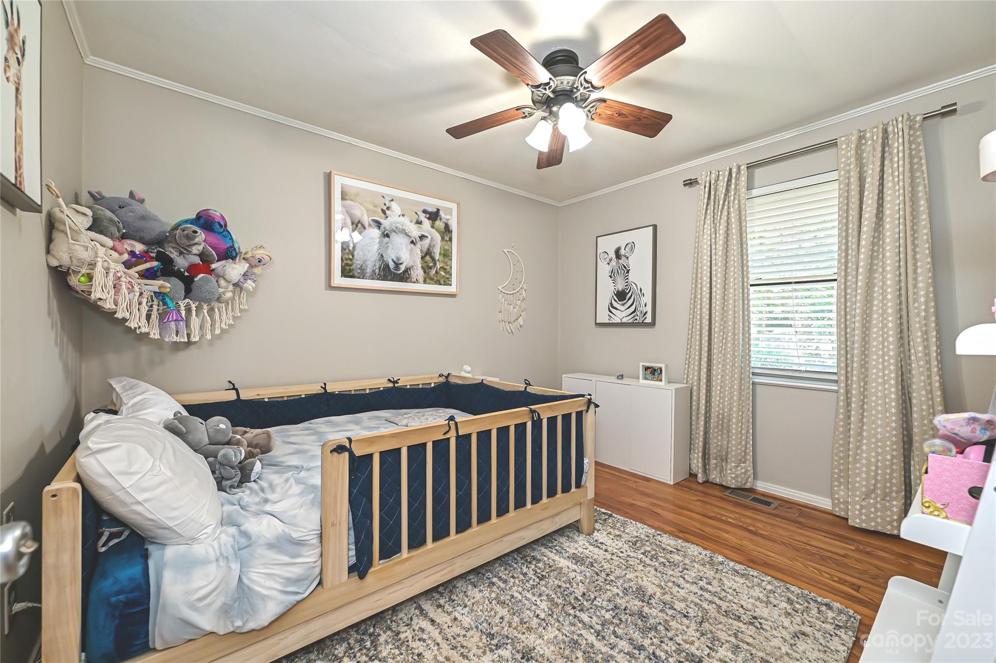 4609 Murrayhill Road Charlotte, NC 28209 - Photo 28 of 38 a bedroom with furniture and a window