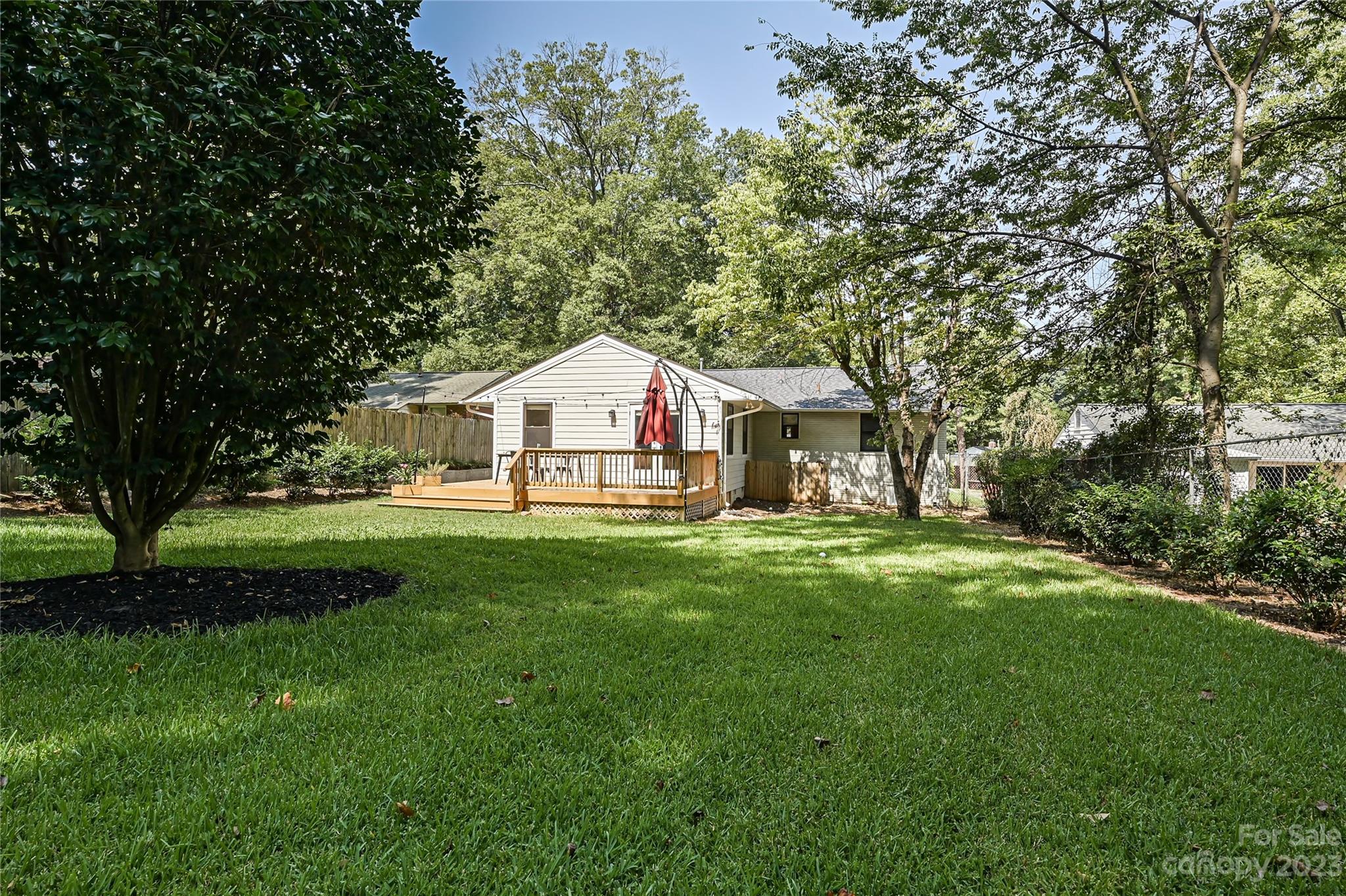 4609 Murrayhill Road Charlotte, NC 28209 - Photo 34 of 38 a front view of a house with garden