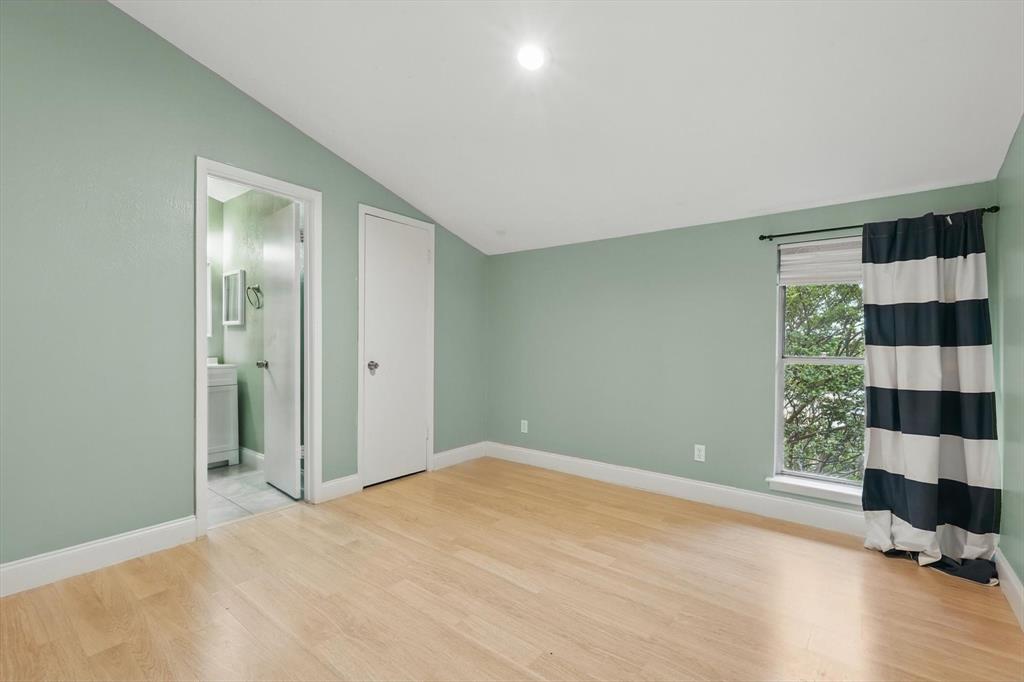 12824 Midway Road, Unit 2136 Dallas, TX 75244 - Photo 24 of 40 a view of a room with a flat screen tv