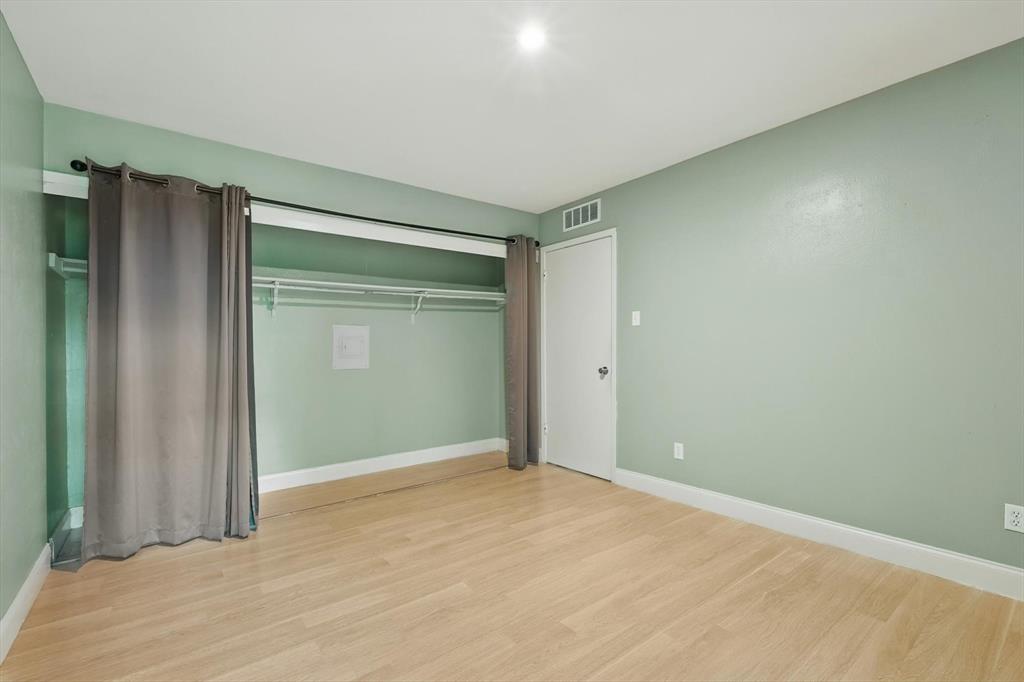 12824 Midway Road, Unit 2136 Dallas, TX 75244 - Photo 32 of 40 a view of an empty room