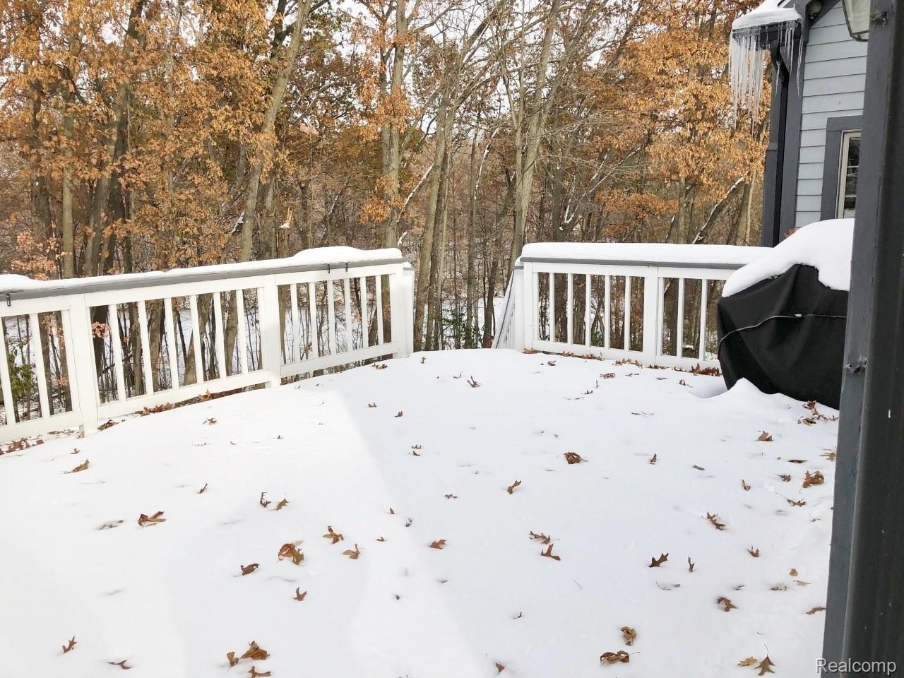 7785 Lee Road Brighton, MI 48116 - Photo 16 of 19 Large deck