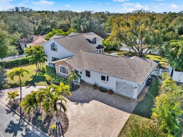 an aerial view of a house with a garden