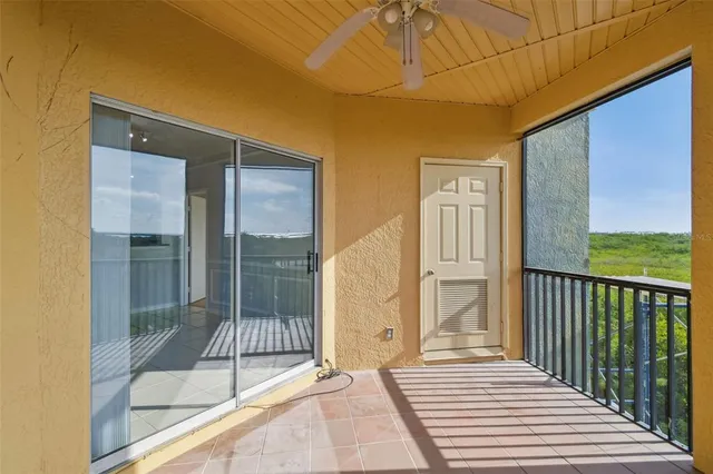 a porch with a glass door