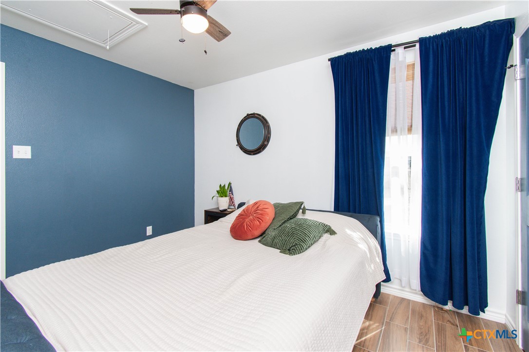 519 Pleasant View Road Troy, TX 76579 - Photo 12 of 30 a bedroom with a bed and a window