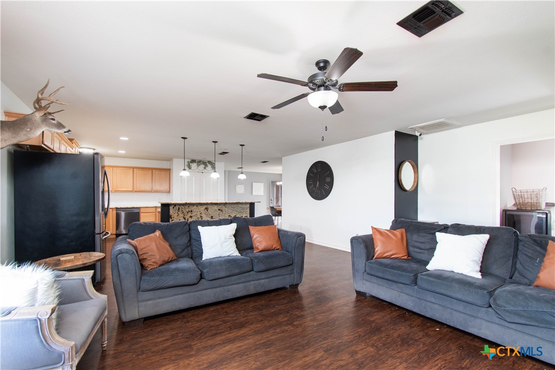 519 Pleasant View Road Troy, TX 76579 - Photo 5 of 30 a living room with furniture and a wooden floor