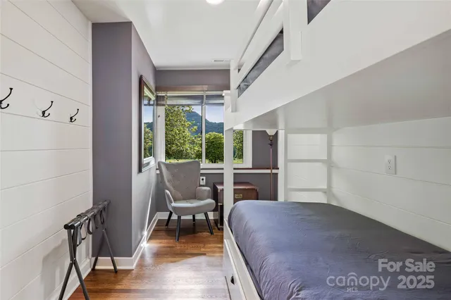 a view of a livingroom with furniture and wooden floor