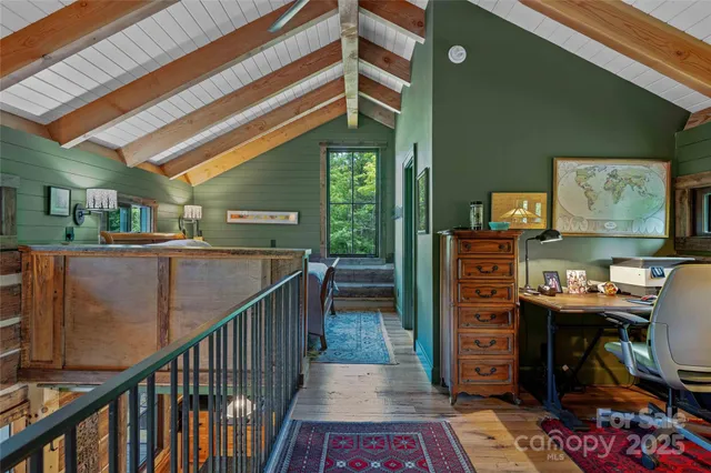 a view of a hallway with workspace