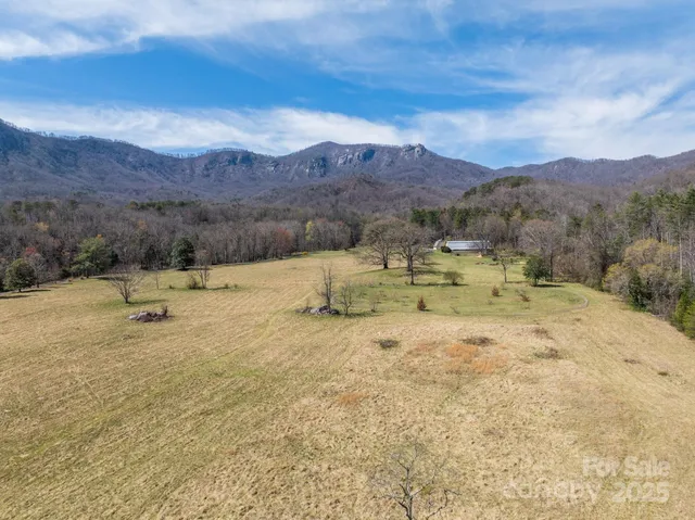 a view of a backyard with mountain and a mountain view