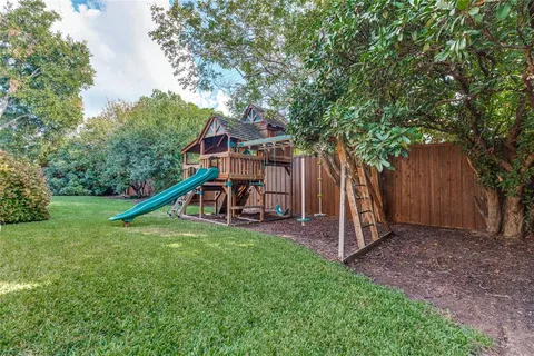 a view of a house with a park